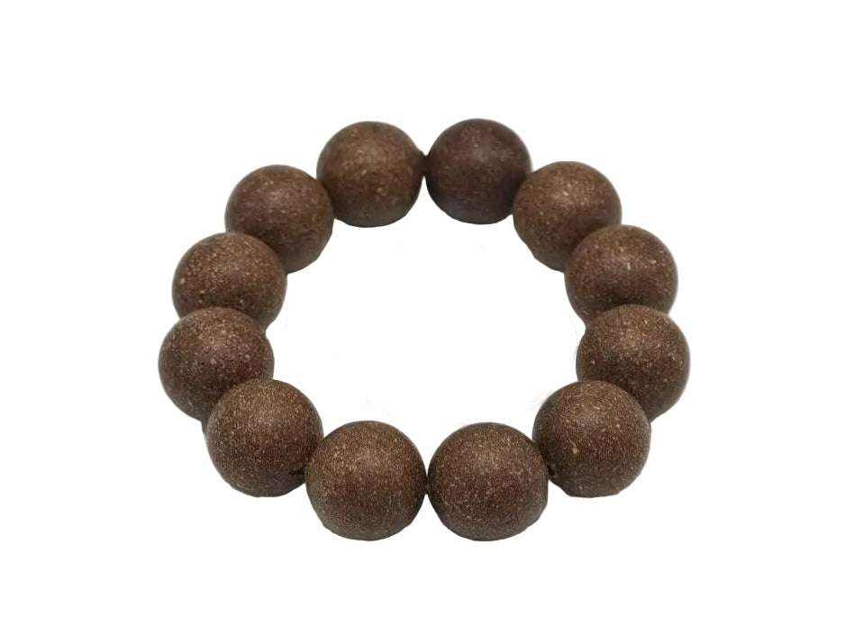 Close-up of Wealth Incense Beads from the Wealth & Luck Series, crafted with traditional Chinese herbal incense ingredients for intention-setting around wealth and prosperity.